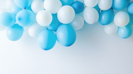 Fototapeta premium Soft blue and white balloons arranged in a dreamy cascade on a clean white background, ideal for a serene and whimsical setting