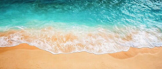 Obraz premium Serene Aerial View of a Tranquil Beach with Soft Ocean Waves and Golden Sand