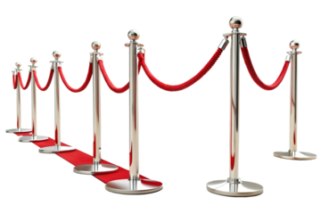 stanchions with red velvet ropes isolated on a white background