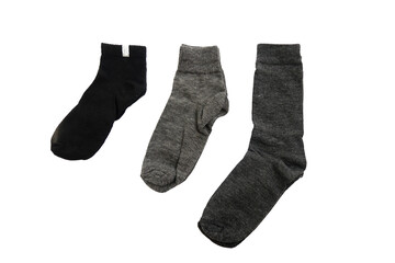 Three pairs of socks, one black and two gray, laid out on a white background. Socks are arranged in order of size from small to large