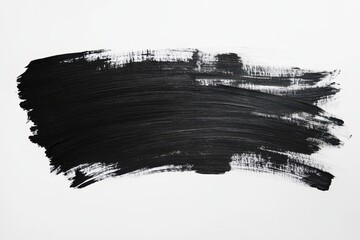 A bold black paint stroke on a white background, emphasizing texture and contrast.