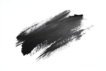 A bold black paint stroke on a white background, showcasing texture and artistic expression.