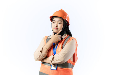 Young Asian female construction worker wearing hijab looks very painful due to headache while holding her head, industrial and construction concept, isolated white background.
