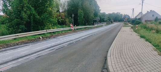 Roboty na drodze. © WalDec