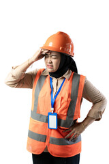 Young Asian female construction worker in hijab who looks very confused standing holding her head, industrial and construction concept, isolated white background.
