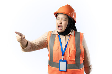 Young Asian female construction worker in hijab who looks very angry and wants to hit something, industrial and construction concept, isolated white background.