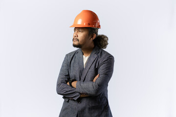 optimistic mens expressions and gestures thinking. stylish asian man with suit and orange helmet on white background. construction or mining business concept photo