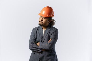 optimistic mens expressions and gestures thinking. stylish asian man with suit and orange helmet on white background. construction or mining business concept photo