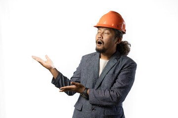 the happy expression of a boss. stylish asian man with suit and orange helmet on white background. construction or mining business concept photoonstruction or mining business concept photo