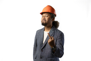 project leader gestures with a middle finger.  stylish asian man with orange suit and helmet on white background. construction or mining business concept photo