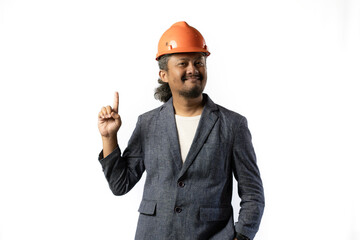 the project leader looks happy and holds up a finger. stylish asian man with orange suit and helmet on white background. construction or mining business concept photo