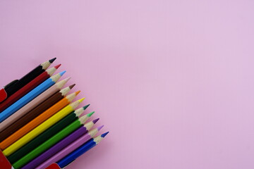Colorful Pencils on Pink Background