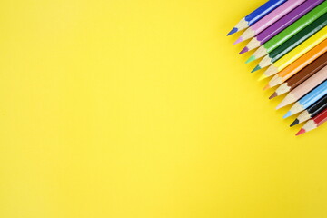 Colorful Pencils on a Yellow Background