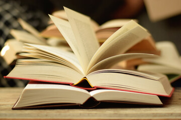 Open red hardcover old thick book. Concept to libraries and reading