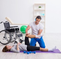 Leg injured woman doing sport exercises with personal coach