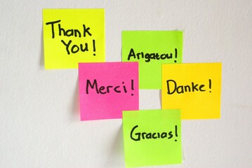 thank you note in various language on colorful sticky notes