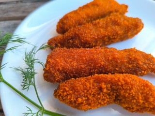 Chicken nuggets on a plate. High-quality photo