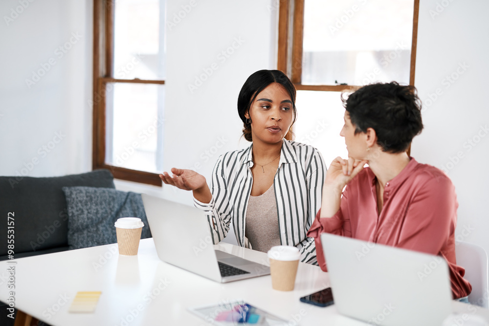 Poster Women, talking or designers on laptop in startup for planning, project review and feedback. Meeting, teamwork or people on technology in agency for online media planner, social network update or news