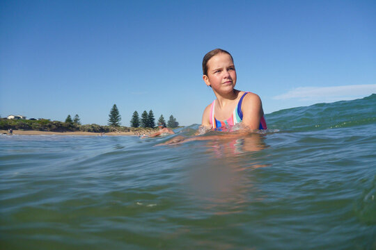 Child catching wave
