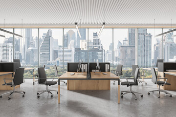 Fototapeta premium Open space office with modern furniture, large windows showcasing a city skyline. Concrete floor and minimalist decor. Concept of a contemporary workspace. 3D Rendering
