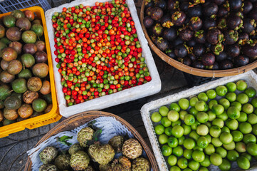 assortment of various tropical exotic fruits at a street market in Thailand in Asia