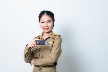 Female Thai government officer in khaki uniforms smiling. Beautiful woman doing winner gesture with arms raised isolated over white background. Concept