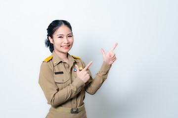 Female Thai government officer in khaki uniforms smiling. Beautiful woman doing winner gesture with arms raised isolated over white background. Concept