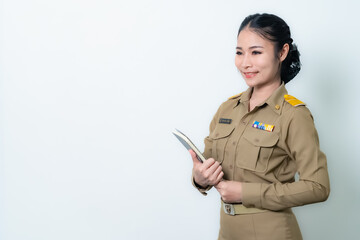 Female Thai government officer in khaki uniforms smiling. Beautiful woman doing winner gesture with arms raised isolated over white background. Concept