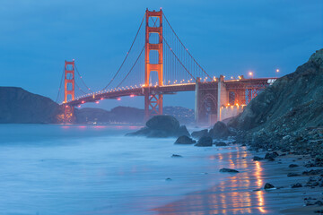 The Golden Gate Bridge in the Blue Hour. Baker Beach, San Francisco, California, USA.