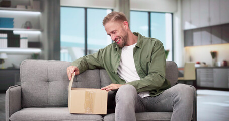 Fototapeta premium Smiling Young Man Sitting