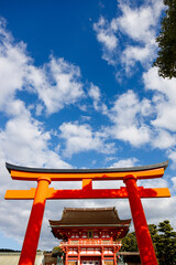 Torii gate at Fushimi Inari shrine in Autumn season. Kyoto, Japan.