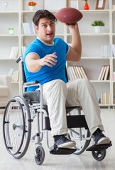 Young man american football player recovering on wheelchair