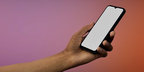 Black African-American male using smartphone with a blank white screen. Gradient, sunset, pink apps mockup. Vertical phone orientation