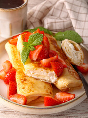 Crepe rolls with cottage cheese