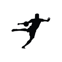 silhouette of a soccer player performing a half body kick

