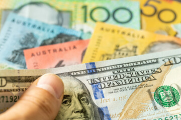 Fototapeta premium Australian Dollar and US Dollar, Currency Exchange Rate. Financial Concept, Currency Markets, close up