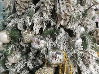 Christmas tree decorated with Pine Cone And Branches. Closeup cone