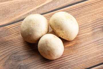 Fototapeta premium Natural organic ripe champignon mushrooms