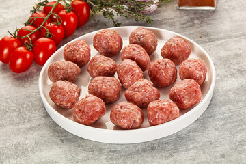 Uncooked raw beef meatball minced