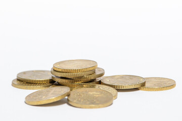 Coins stacked on white background