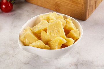 Crushed parmesan cheese in the bowl