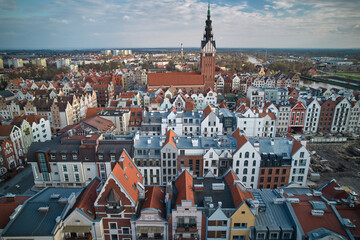 Obraz premium Aerial View of Elbląg Old Town with Gothic Church Tower and Historic Architecture, Poland