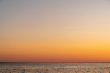 Sunset sea beach. Sun sky ocean. Sunrise water landscape. Clouds nature horizon wave coast. Evening beautiful orange dusk.