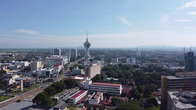 High-definition aerial footage showcasing Menara Alor Setar, an iconic telecommunications tower in Kedah, Malaysia