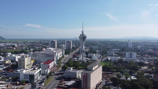 High-definition aerial footage showcasing Menara Alor Setar, an iconic telecommunications tower in Kedah, Malaysia