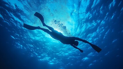 expert swimmer submerged in a chasm, lonely against a blue backdrop