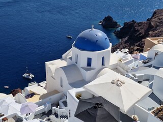 Domes of Santorini in Oia with ocean