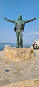Monumento a Domenico Modugno in Polignano a Mare, Italy