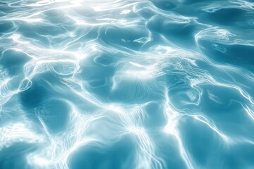 Obraz premium A light blue background with ripples of water, top view