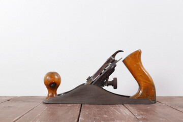Tools Building and repair - Side view Rusty hand plane wall background